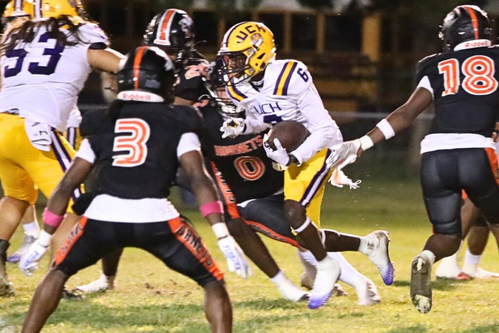 Union County's Bobo Woodall with a run against Hawthorne on Friday.