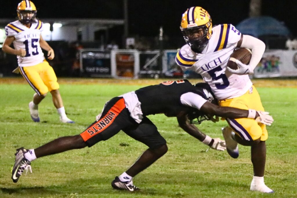 Union County's Johnte Nichols gets past Hawthorne's Jordin Fluellen in the first quarter on Friday.