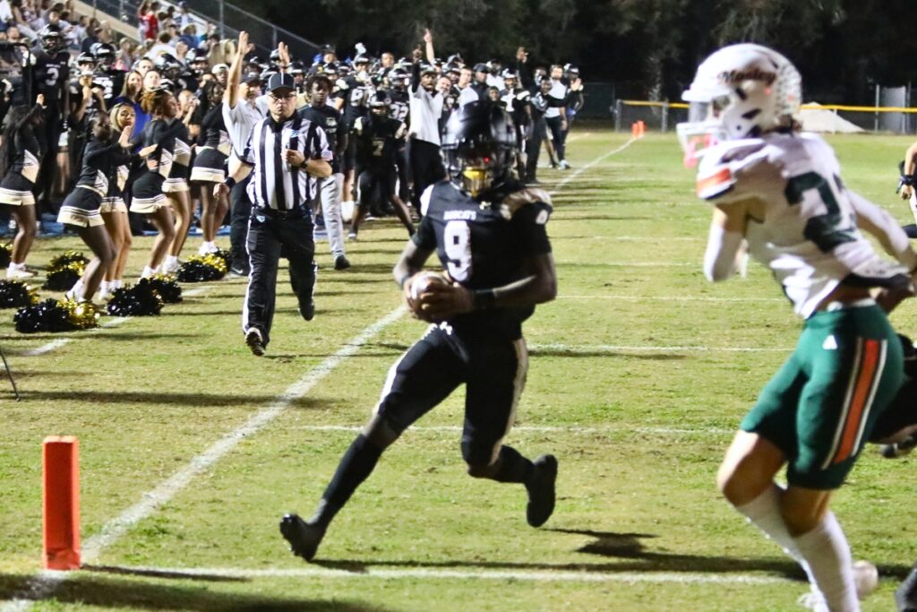 Buchholz's D.J. Hicks scores a second quarter touchdown to put the Bobcats ahead 49-0 against Mosley on Thursday.