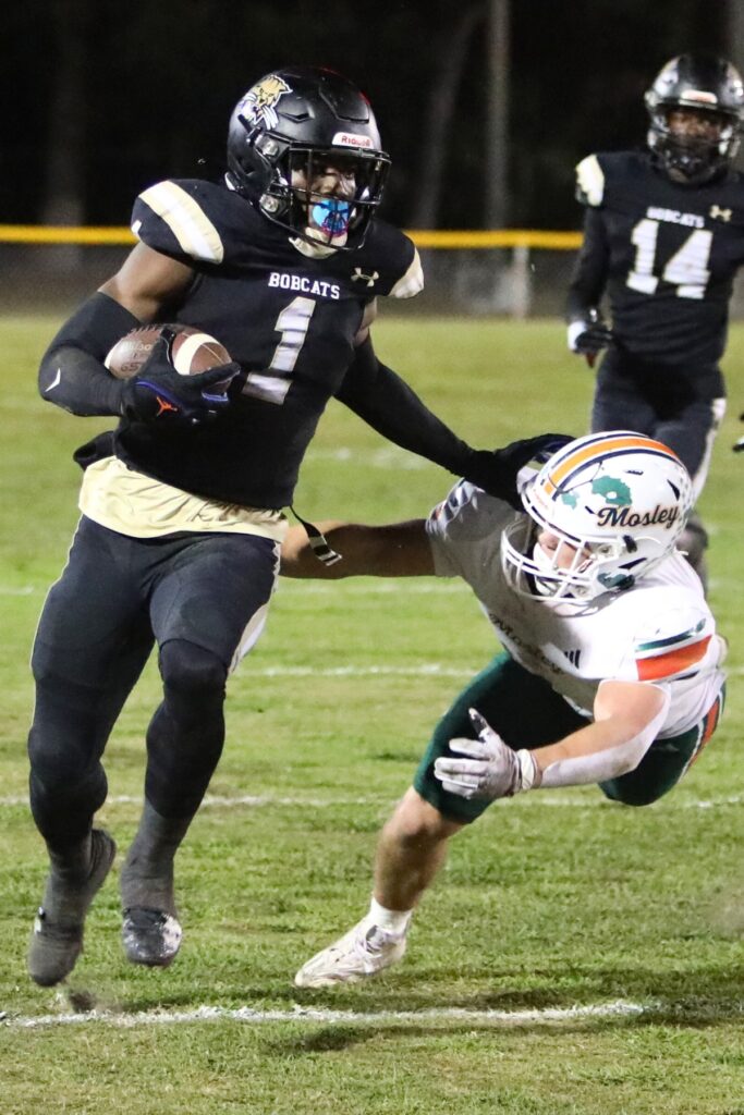 Buchholz's Jordan Richardson returns a second quarter punt against Mosley on Thursday.