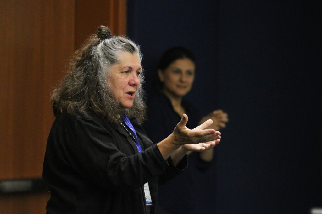 Dr. Nancy Ruzycki introduces the different school districts and teams for the contest.