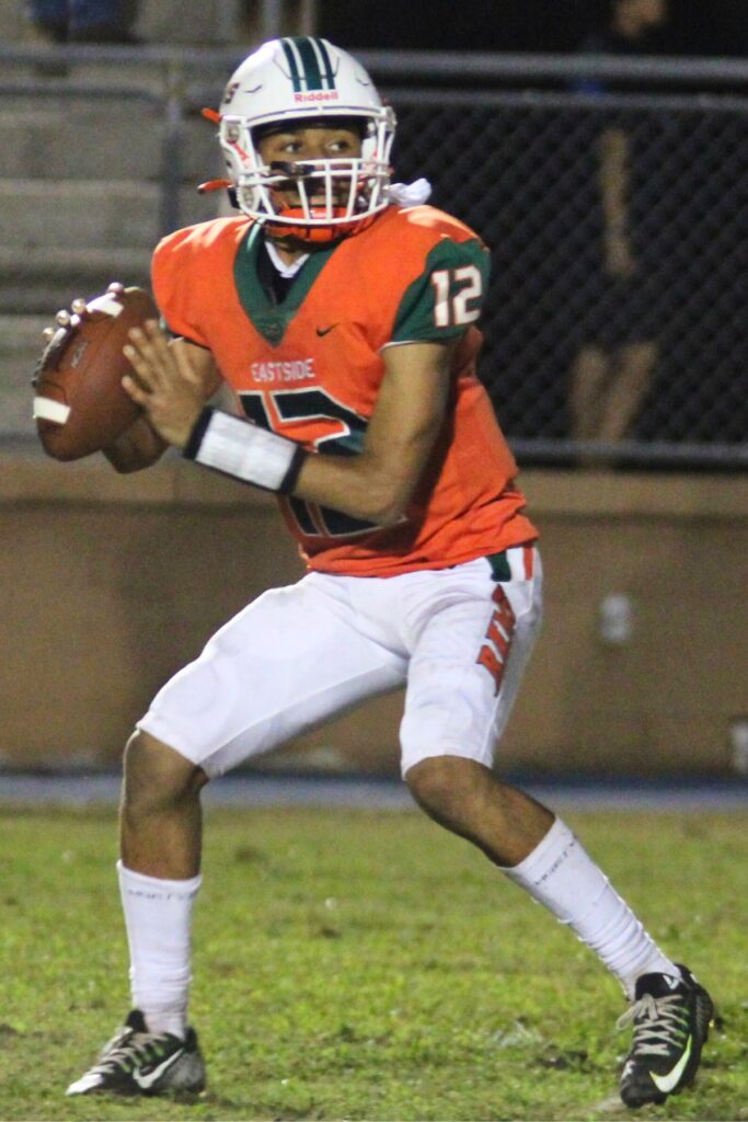 Eastside's Adrian Curtis looks to pass against Palatka on Friday.