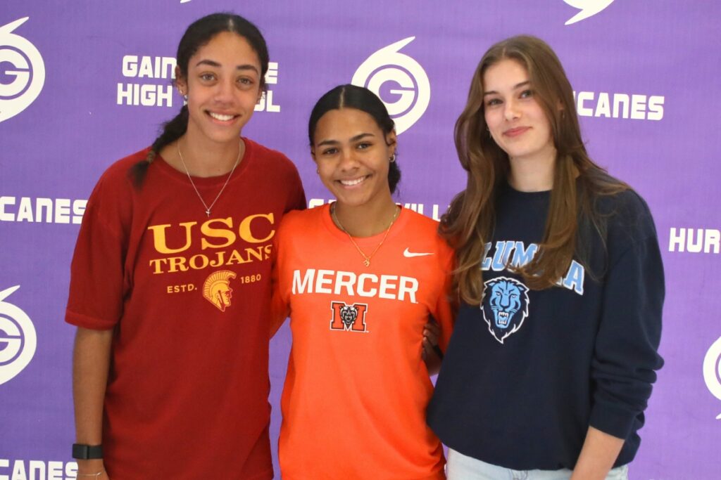 (From left) Gainesville's Brooklyn Tealer, Meme Davis and Charlotte Gravlee signed college letters of intent on Wednesday.