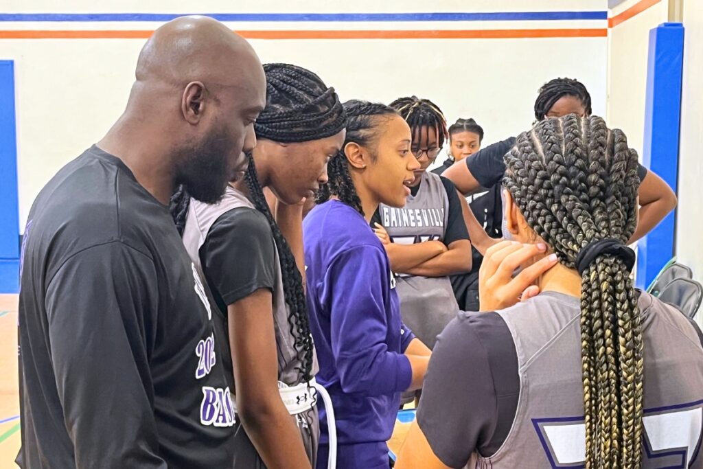 Gainesville coach Jazlynd Rollins talks strategy with the Lady Hurricanes at the Insider Exposure Thanksgiving Classic in Jacksonville on Tuesday.