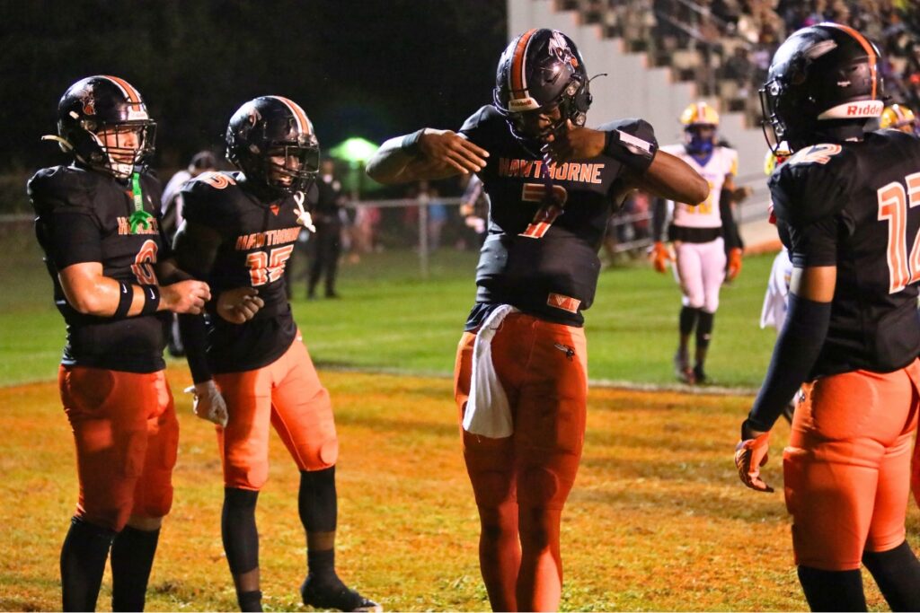 Hawthorne's C.J. Ingram (7) celebrates after scoring a touchdown in the first quarter against Newberry on Friday.