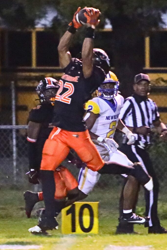 Hawthorne's Jamarion Davenport with a second quarter interception against Newberry on Friday.