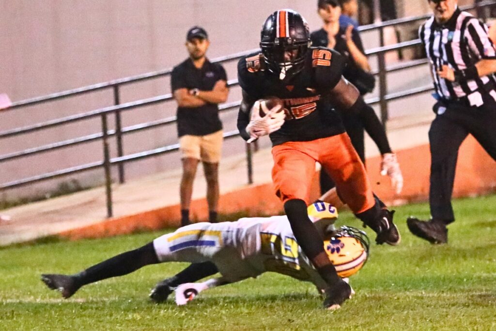 Hawthorne's Matthew McKinley-Daniels with a first quarter reception against Newberry on Friday.