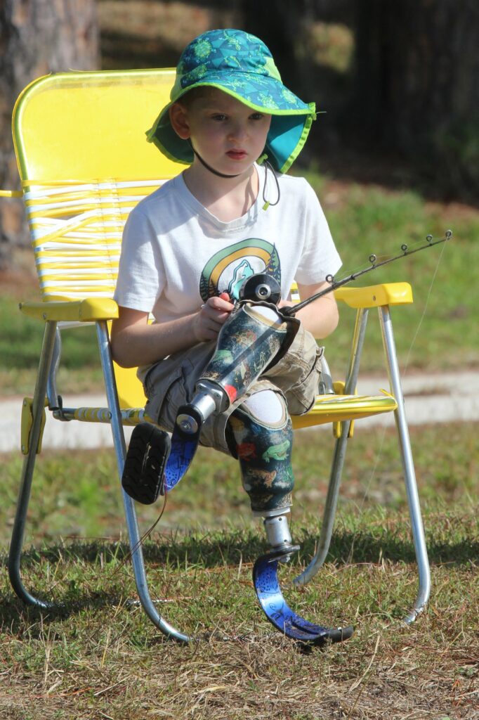 Littlewood Elementary Student Ansel Meadows Rader, 8, waits patiently for a bite.