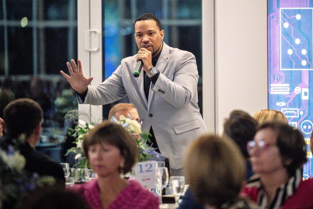 Micah Johnson sings at the Community Foundation of North Central Florida's 25th anniversary event on Thursday.