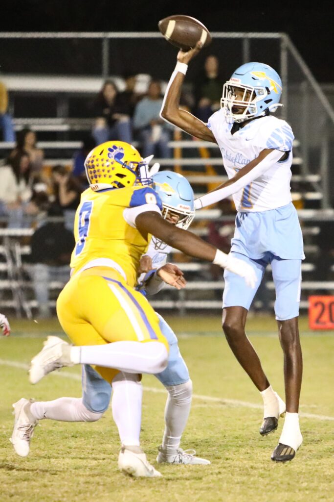 Newberry's Mykah Newton pressures Chiefland's Thomas Pettigrew on Friday.