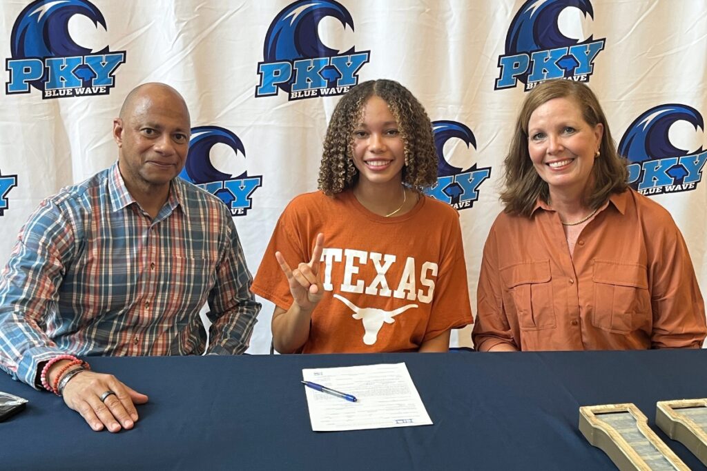 P.K. Yonge's Lillie Nesty (center) with dad, Anthony (left) and mom, Deanne (right) at her college signing on Thursday.