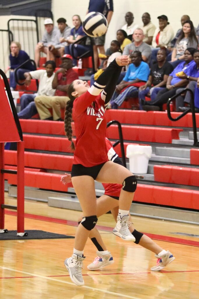 Williston's Jenna Yancey with a dig against Newberry on Tuesday.