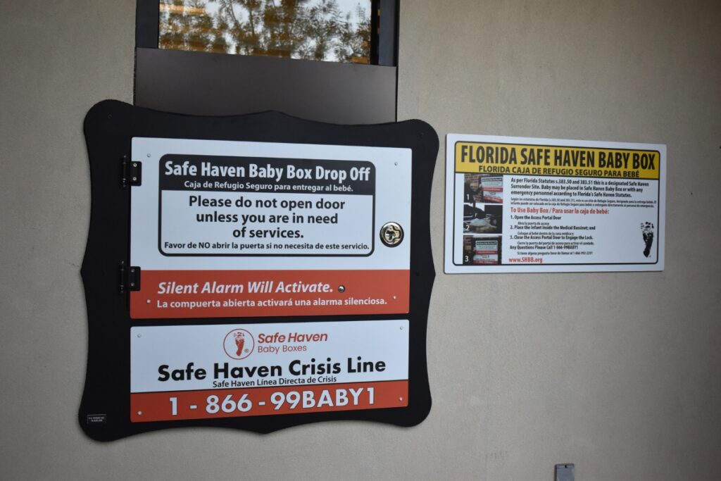 An alarm sounds when a child is placed inside the baby box.