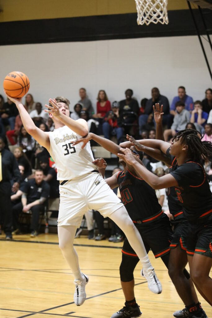 Buchholz's Palmer Watson get's fouled during the third quarter against Eastside.