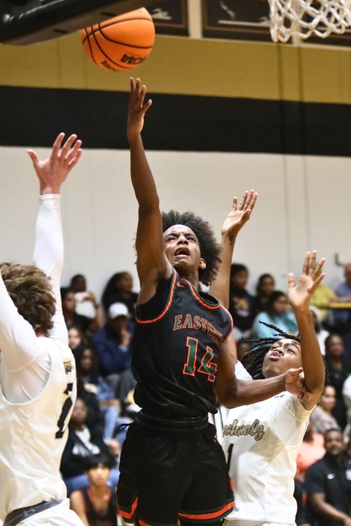 Eastside's Quashawn Brittingham with a third quarter shot against Buchholz's Cedric Collins.