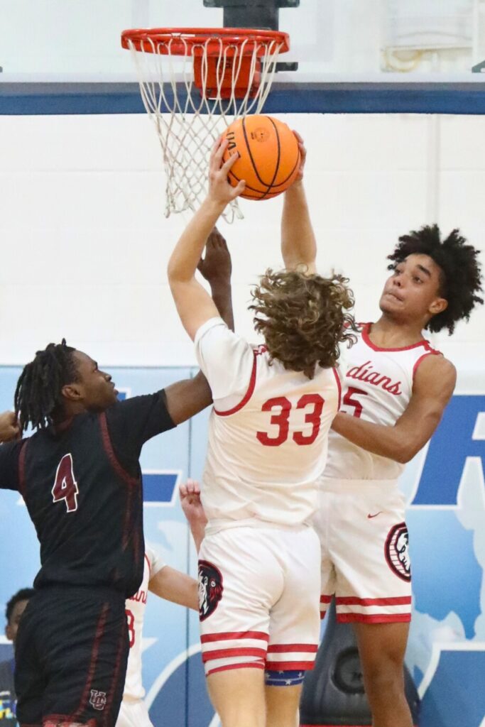 Fort White's Brandon Demartino (33) grabs a rebound against Union Grove (GA) at the Florida Get Down Showcase.