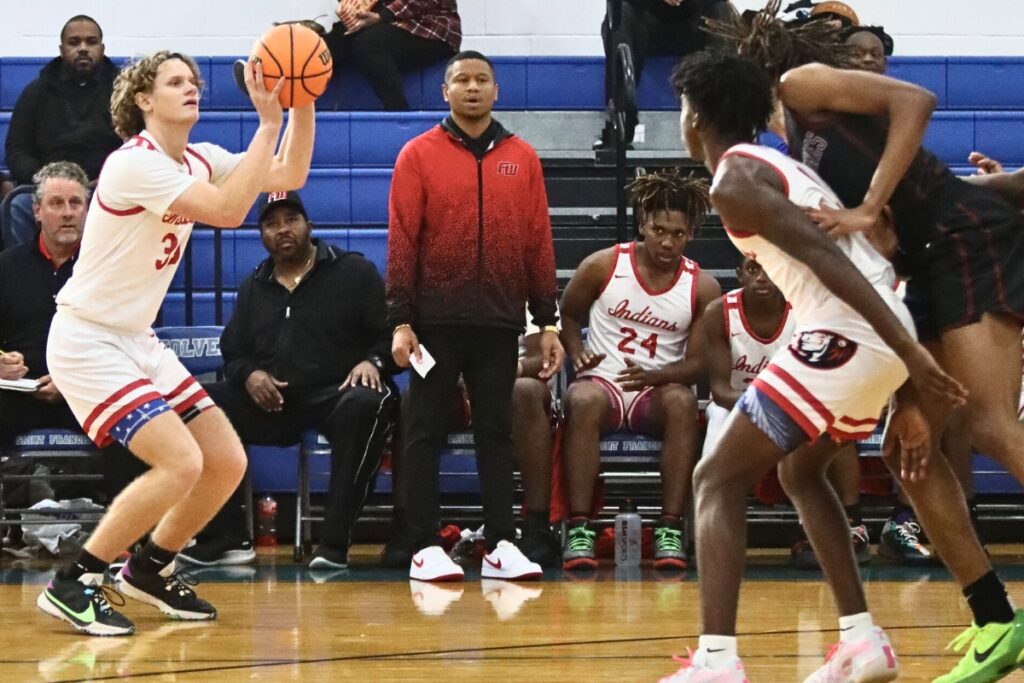 Fort White's Brandon Demartino spots up for a 3-point shot against Union Grove (GA) at the Florida Get Down Showcase.