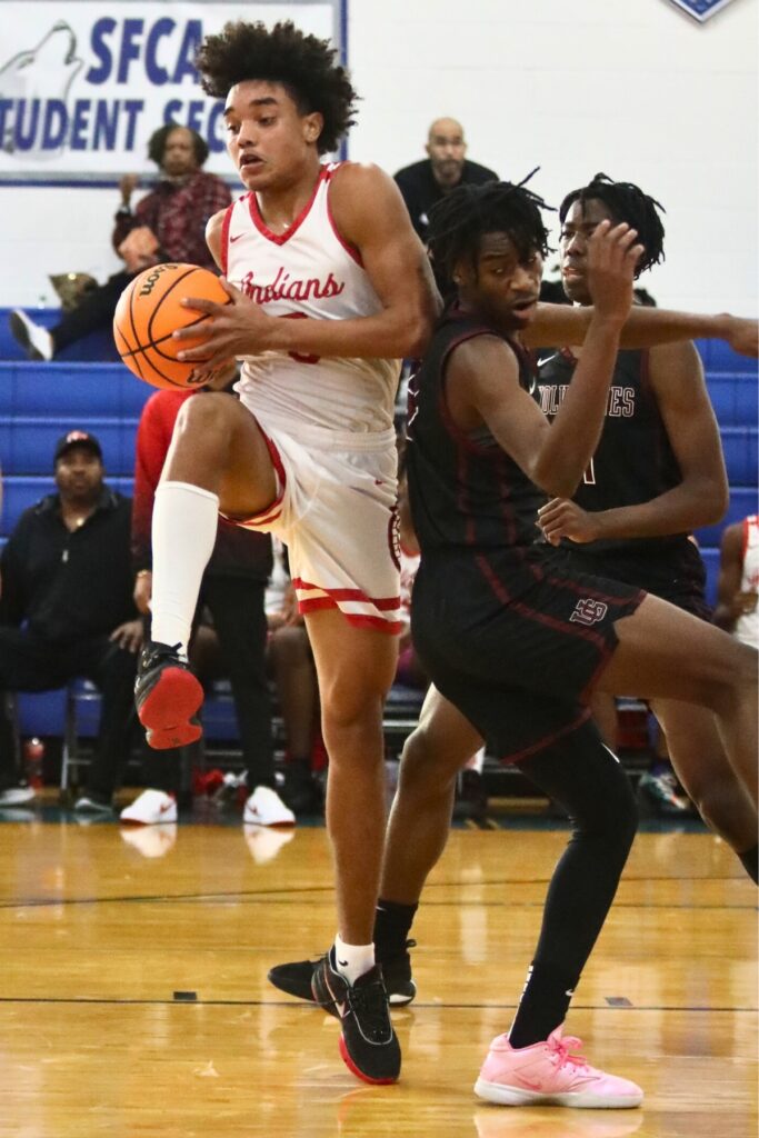 Fort White's Taferi Moe protects the ball against Union Grove (GA) at the Florida Get Down Showcase.