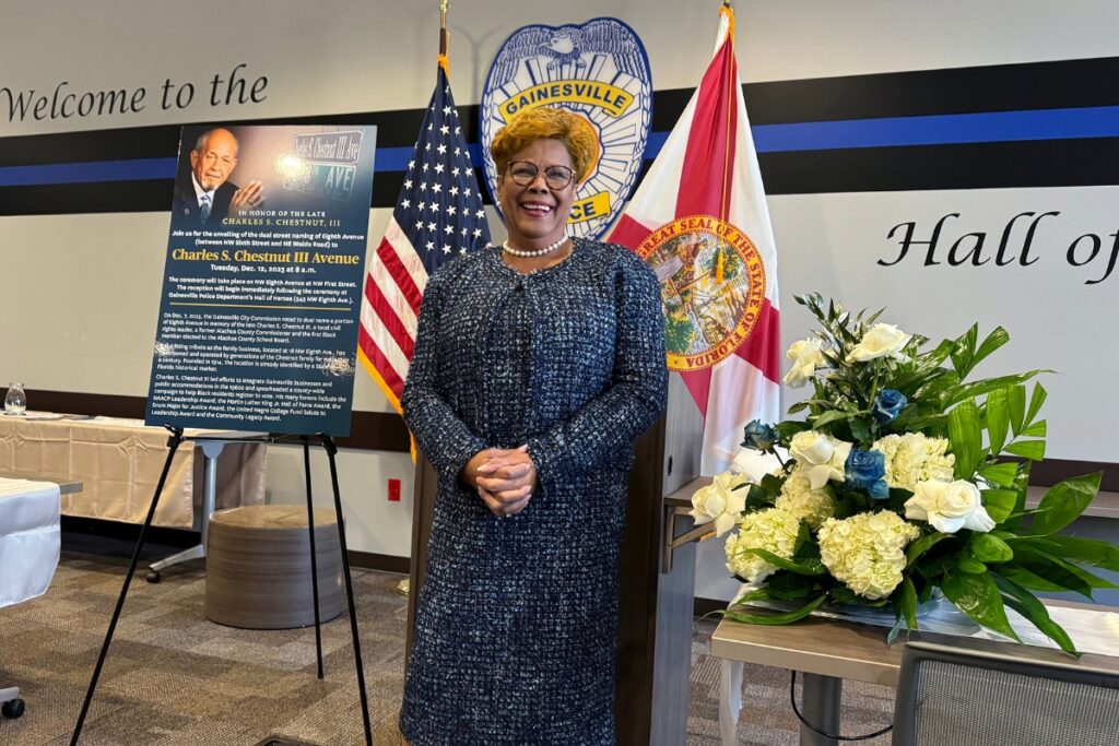 Gainesville City Commissioner Cynthia Chestnut thanks attendees during a gathering at the Gainesville Police Department after the unveiling.