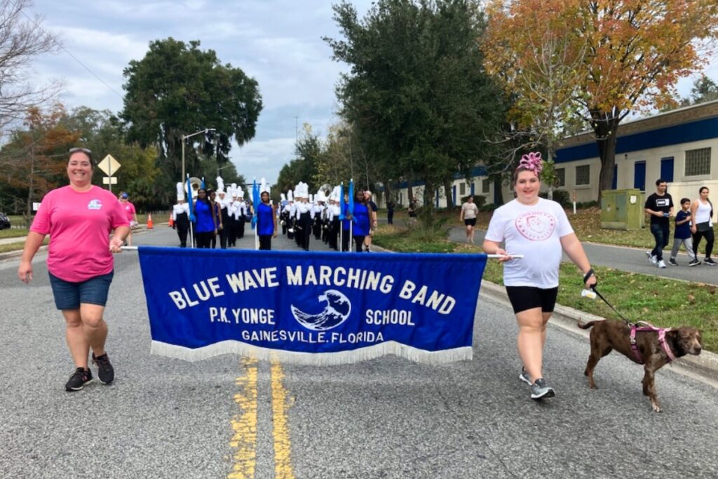 The P.K. Yonge School Blue Wave marching band at A Very GNV Holiday Parade on Saturday.