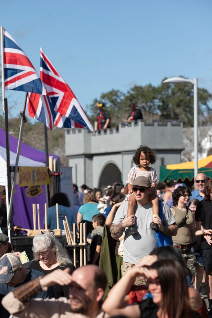 A sizeable audience observes the Topsy Turvy show.