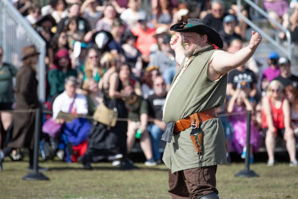 A tournament fighter boasts to his opponent before battle.