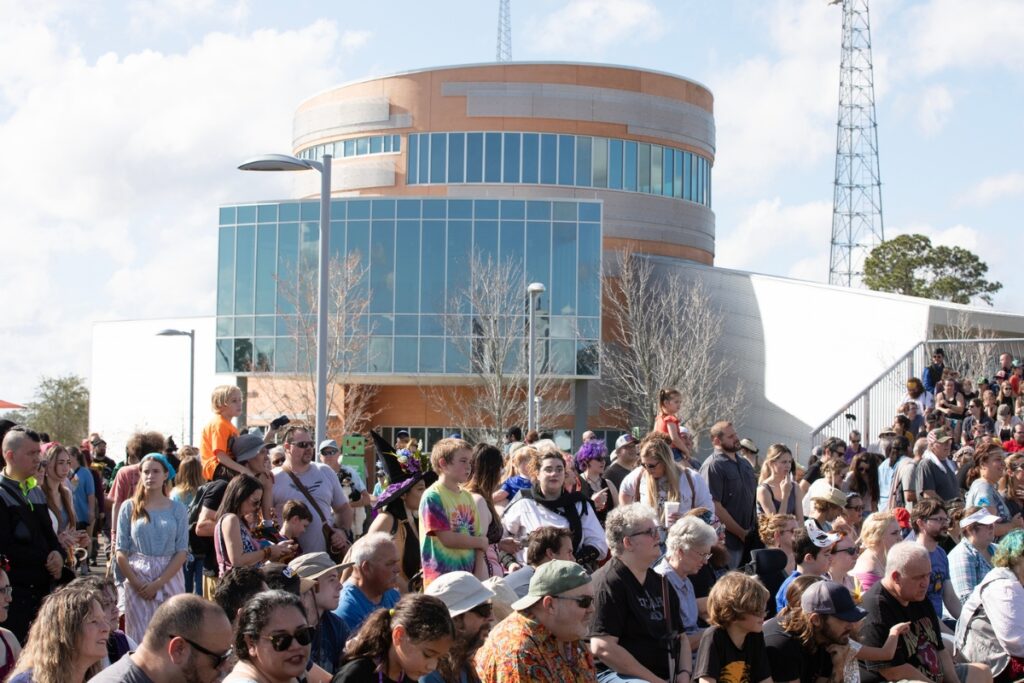 Audience members marvel at the Living Chessboard tournament in Depot Park.