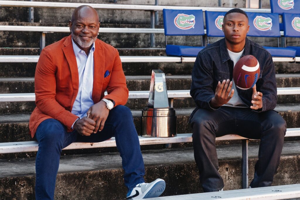 Florida Gators signee D.J. Lagway was presented the 2023-24 Gatorade Player of the Year by former Gator and NFL great Emmitt Smith (left).