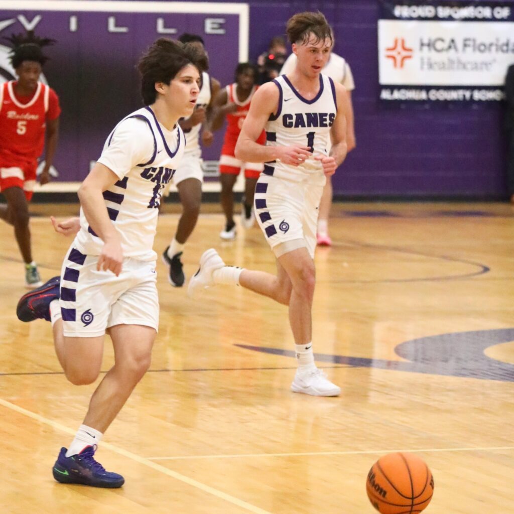 Gainesville's Simon Childers with a second quarter steal for a layup against Santa Fe.