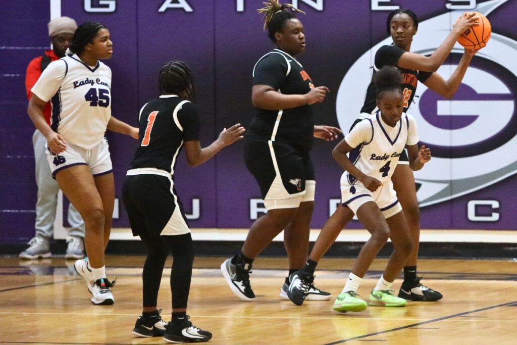 Hawthorne's Ashlyn Coleman with a rebound against Gainesville.