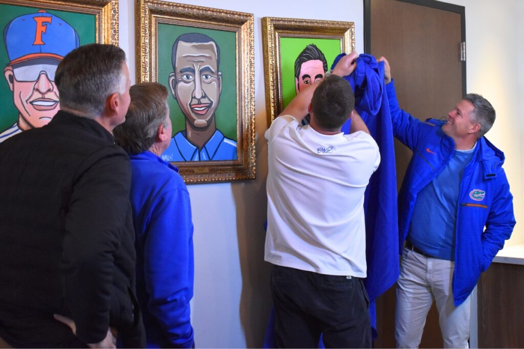 James “Batesy” Bates and J.C. Deacon unveil the new portrait.