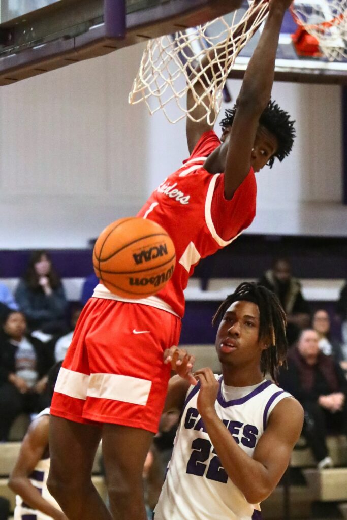 Santa Fe's Antonio Hall with a first quarter dunk against Gainesville.