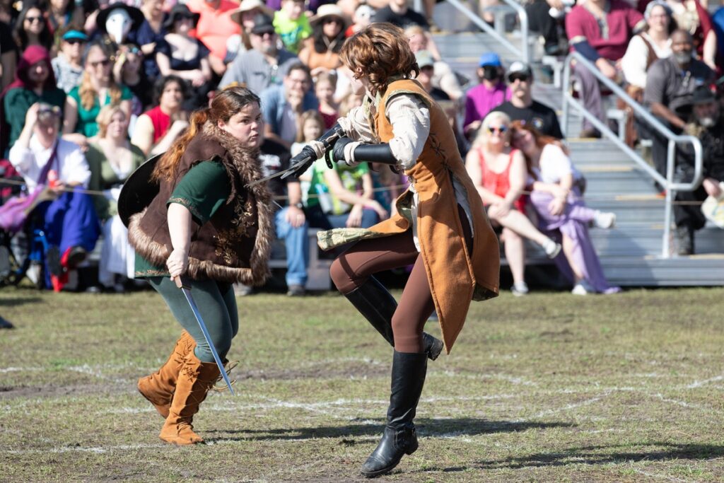 Two women battle as part of the Living Chessboard tournament.