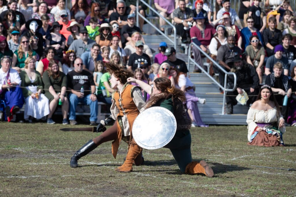 Two women battle as part of the Living Chessboard tournament.