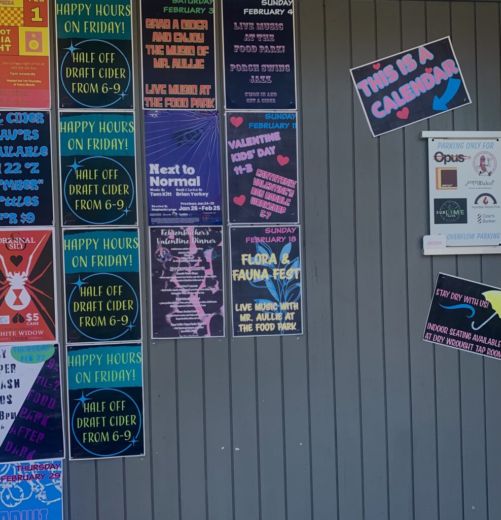 A community calendar outside of Dry Wrought Cider.