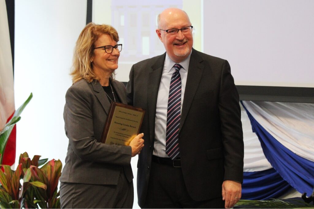 Mayor Harvey Ward presents the Mayor's Award for Excellence in the Arts to Cynthia Barnett.