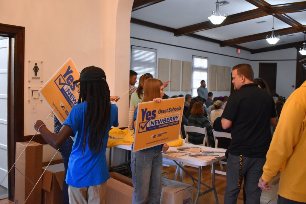 To successfully convert a school, at least half of the households must turn out to vote.