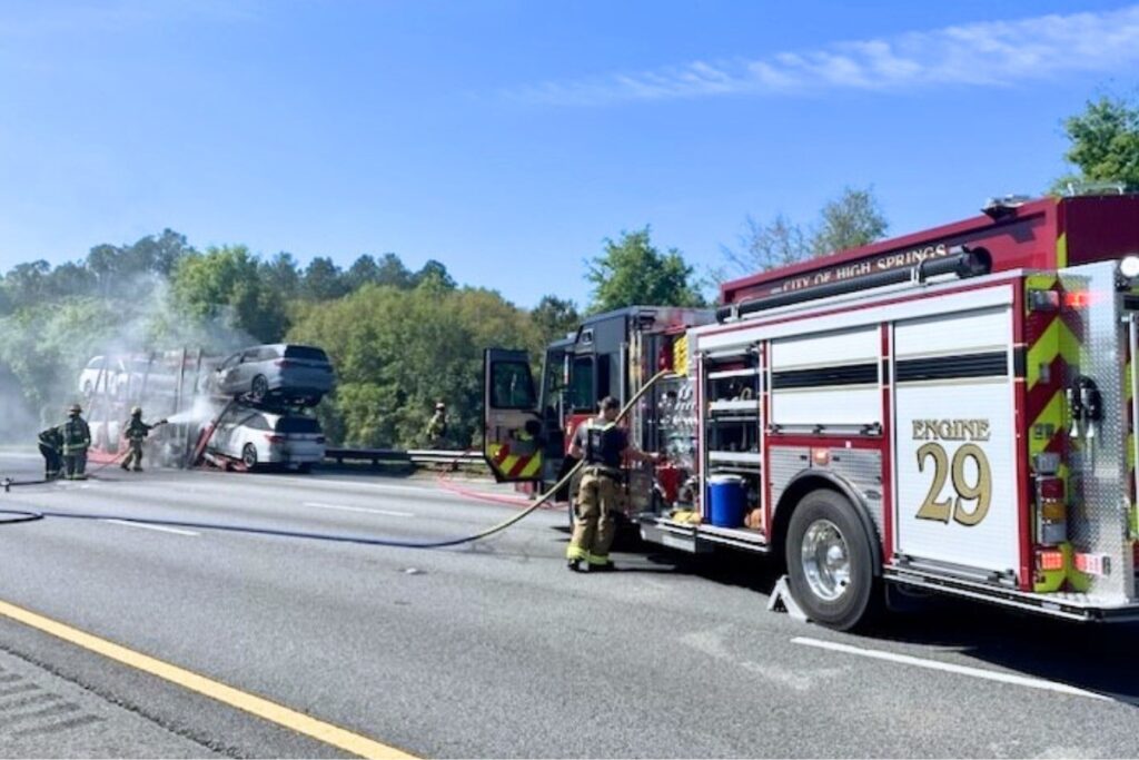 A car hauler trailer and four vehicles sustained damage Wednesday morning in a fire on I-75 south of Alachua.