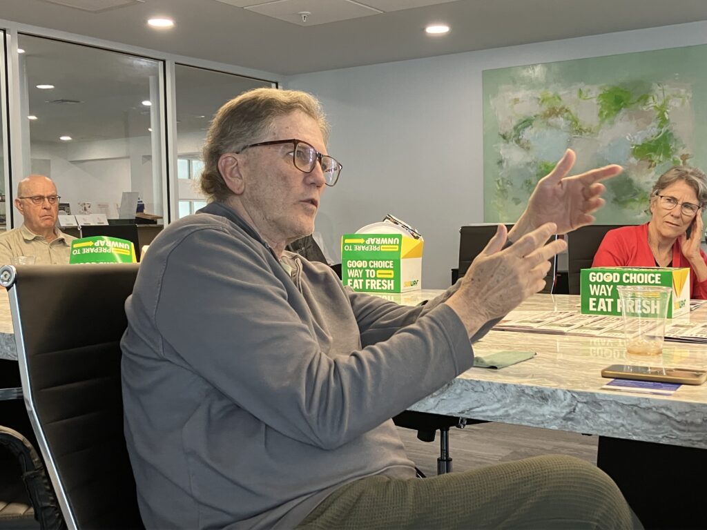 Mainstreet member Kim Popejoy asks Hinson a question during Thursday's event. 