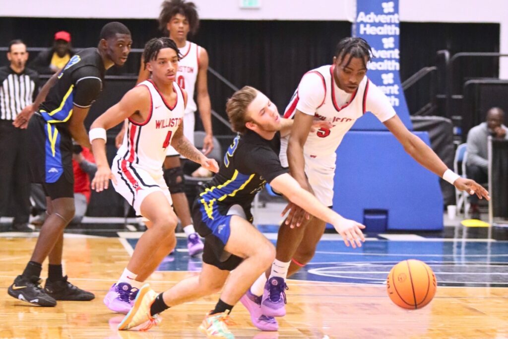 Williston's Deandre Harvey goes after a loose ball against Chipley in the Class 1A State Semifinal game at FP Funding Center in Lakeland.