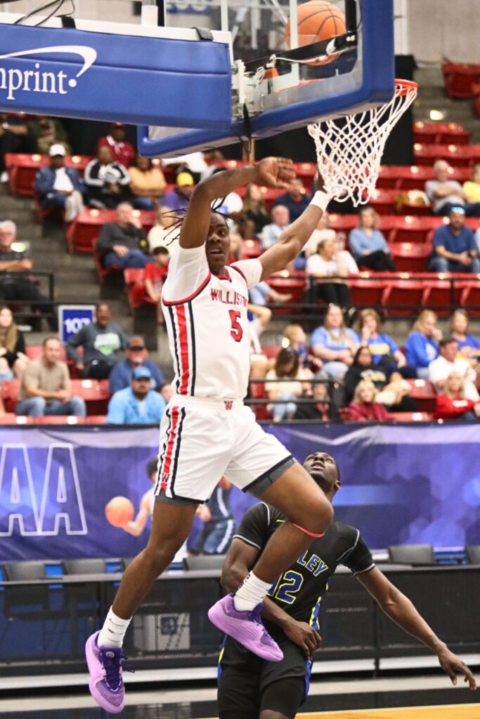 Williston's Deandre Harvey puts up a shot against Chipley in the Class 1A State Semifinal game at FP Funding Center in Lakeland. (1)