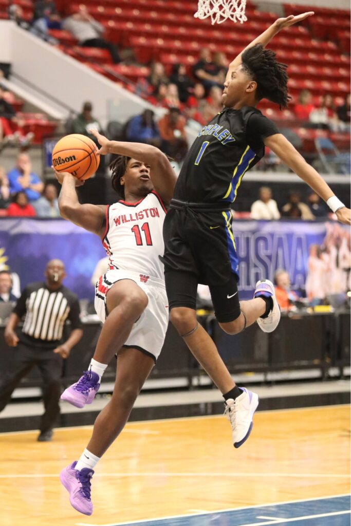 Williston's Jace McDonald puts up a fourth quarter shot against Chipley in the Class 1A State Semifinal game at FP Funding Center in Lakeland.