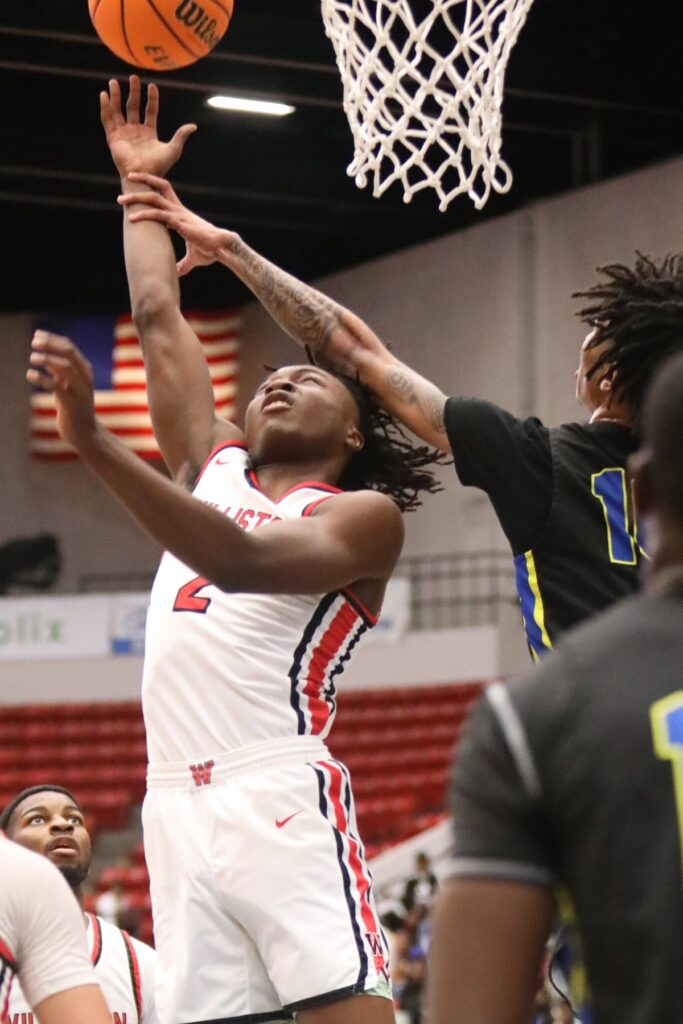 Williston's Javon Brown gets fouled on a shot attempt against Chipley in the Class 1A State Semifinal game at FP Funding Center in Lakeland.
