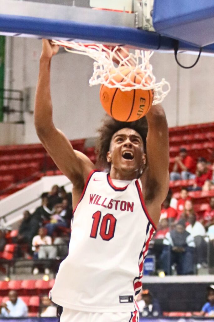 Williston's Kyler Lamb with a fourth quarter dunk against Chipley in the Class 1A State Semifinal game at FP Funding Center in Lakeland.