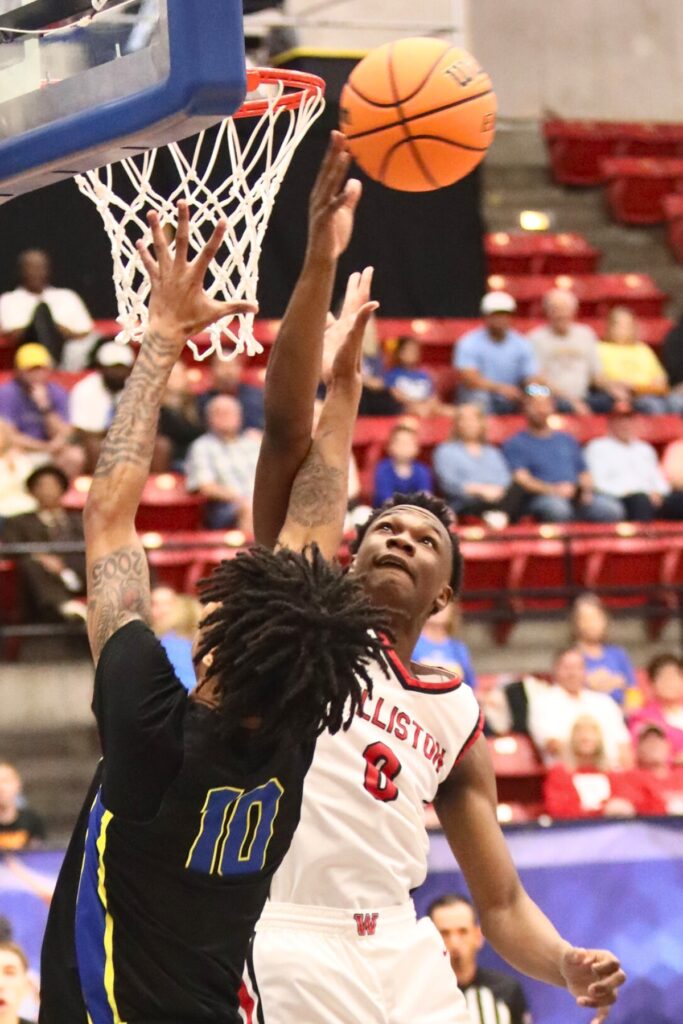 Williston's Reggie White blocks a shot against Chipley in the Class 1A State Semifinal game at FP Funding Center in Lakeland.