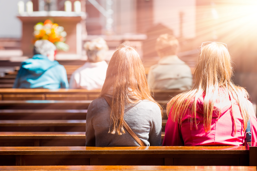 People praying in a church