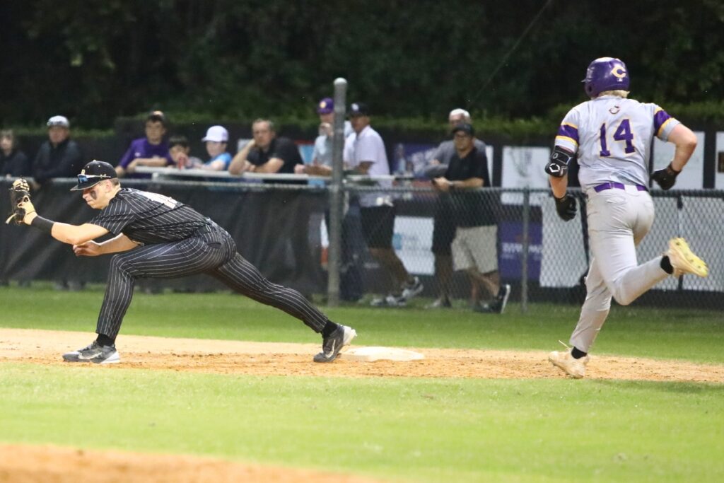 Buchholz first baseman Austin Cardozo stretches to get the first out in the top of the fourth inning against Columbia's Max Shuler.