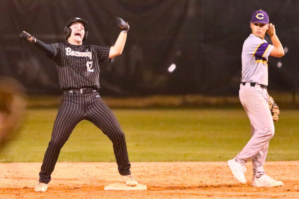 Buchholz's Conner Brown celebrates his two-run double that put the Bobcats ahead 3-2 in the bottom of the fourth inning against Columbia.
