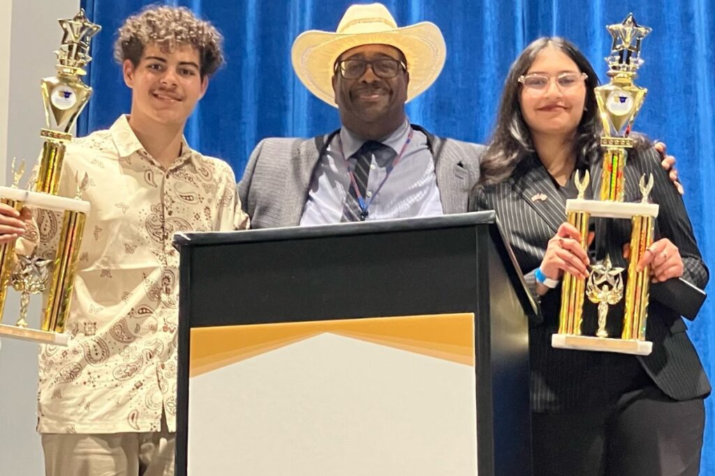 Eastside's first-place winners at the FSDI competition included (from left) Edrian Colburn-Deliz, coach Marna Weston and and Sanabil Wajid.