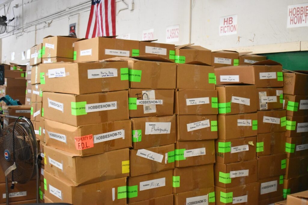 FOL has received more donations than can fit on the shelves, so some books are kept to the side and will be used to restock once the sale is running.